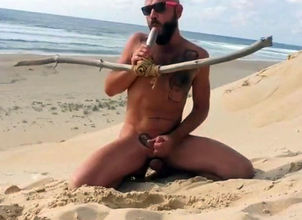 nails himself on the beach with..