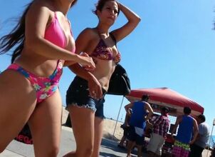 Candid latina in swimsuit with..